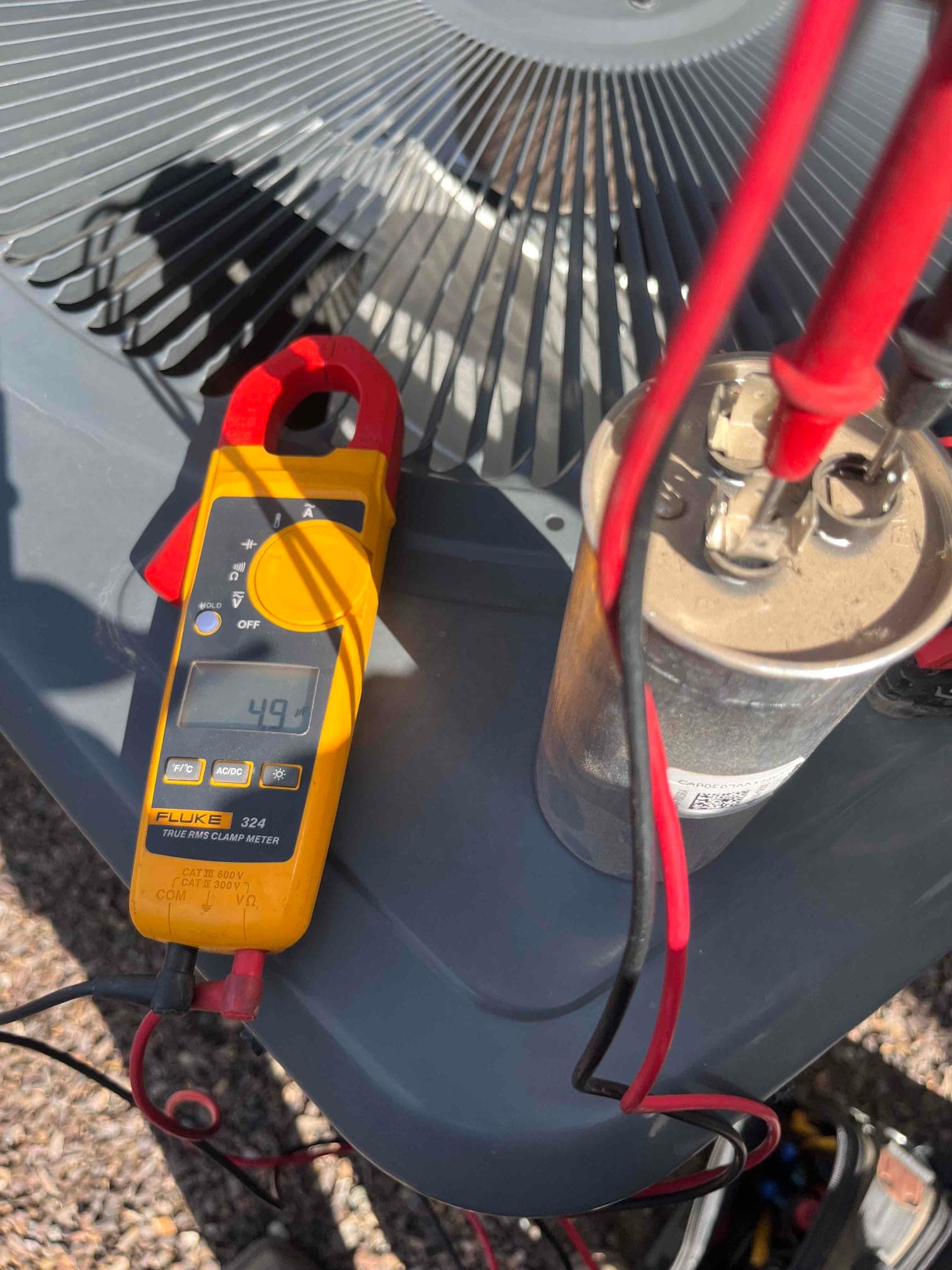 HVAC diagnostic instrument photographed during the service visit.